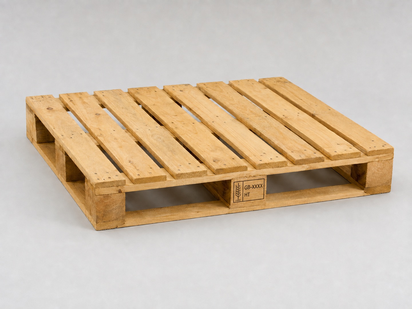 UK standard wooden block pallet with an illustrative IPPC heat-treatment stamp